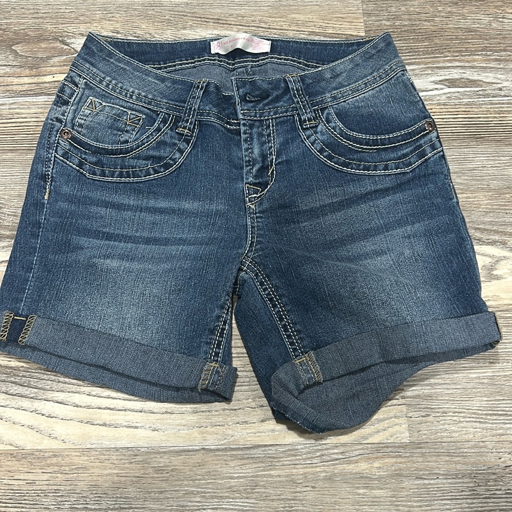 jean shorts with design on pockets